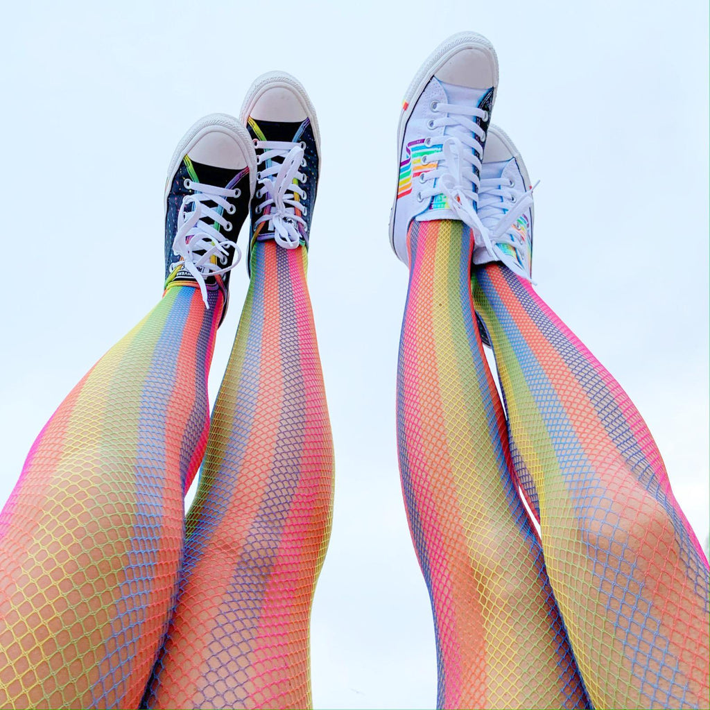 Model wearing rainbow coloured fishnets