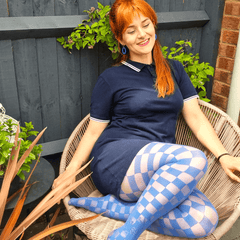 Woman wearing blue checkboard racy tights