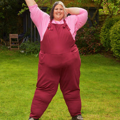 Woman wearing burgundy dungarees