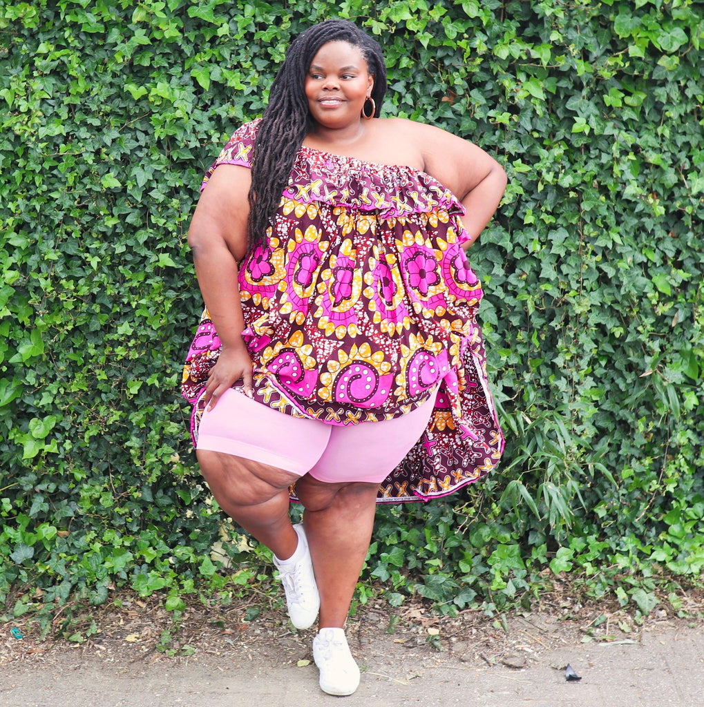 Woman wearing dragon fruit chub rub shorts