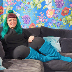 Woman wearing blue thigh high socks